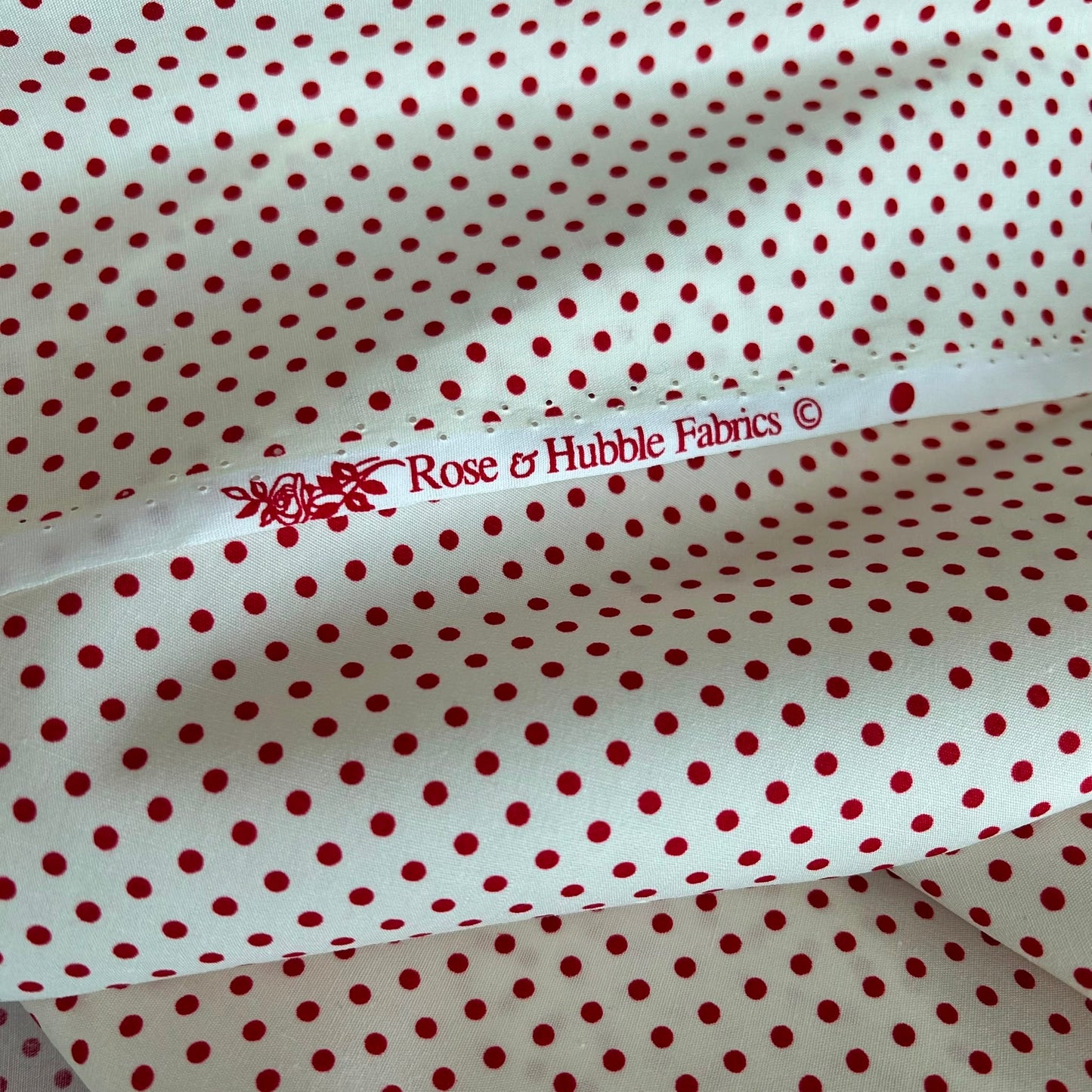 Cotton poplin fabric Cream with 3mm Red spots by Rose & Hubble