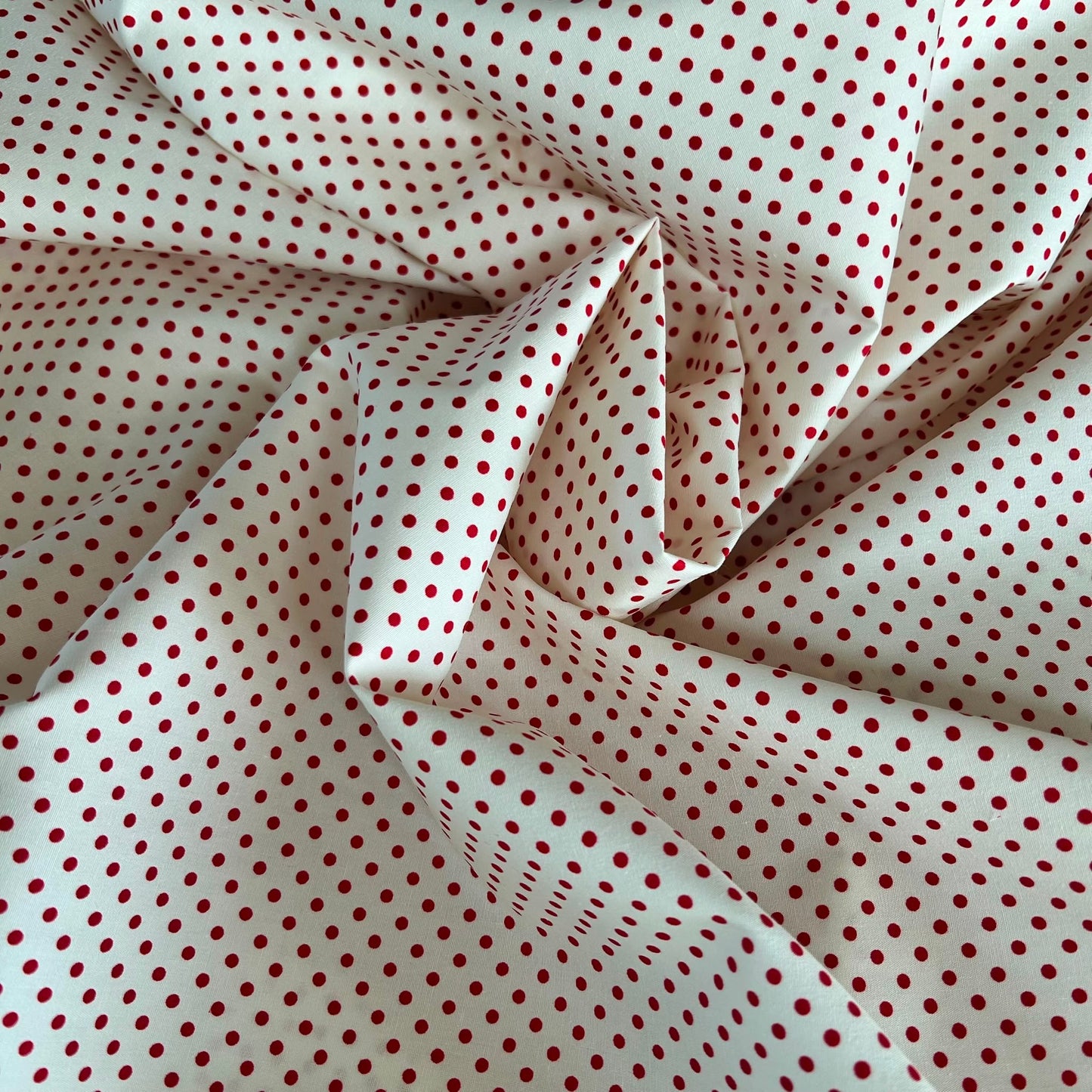 Cotton  poplin fabric Cream with 3mm Red spots by Rose & Hubble